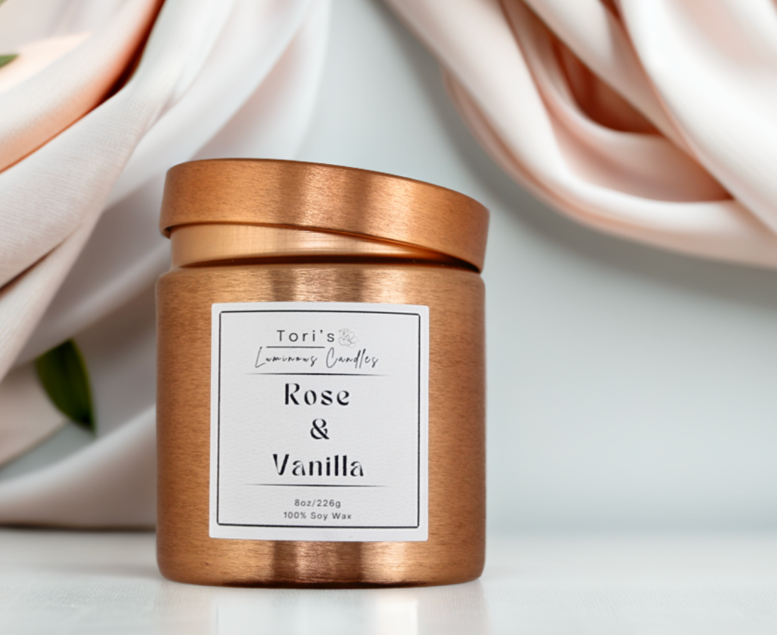 Rose and vanilla candle in a sleek 8 oz copper vessel, offering a warm, elegant glow—perfect for adding a touch of timeless charm and serenity to any space