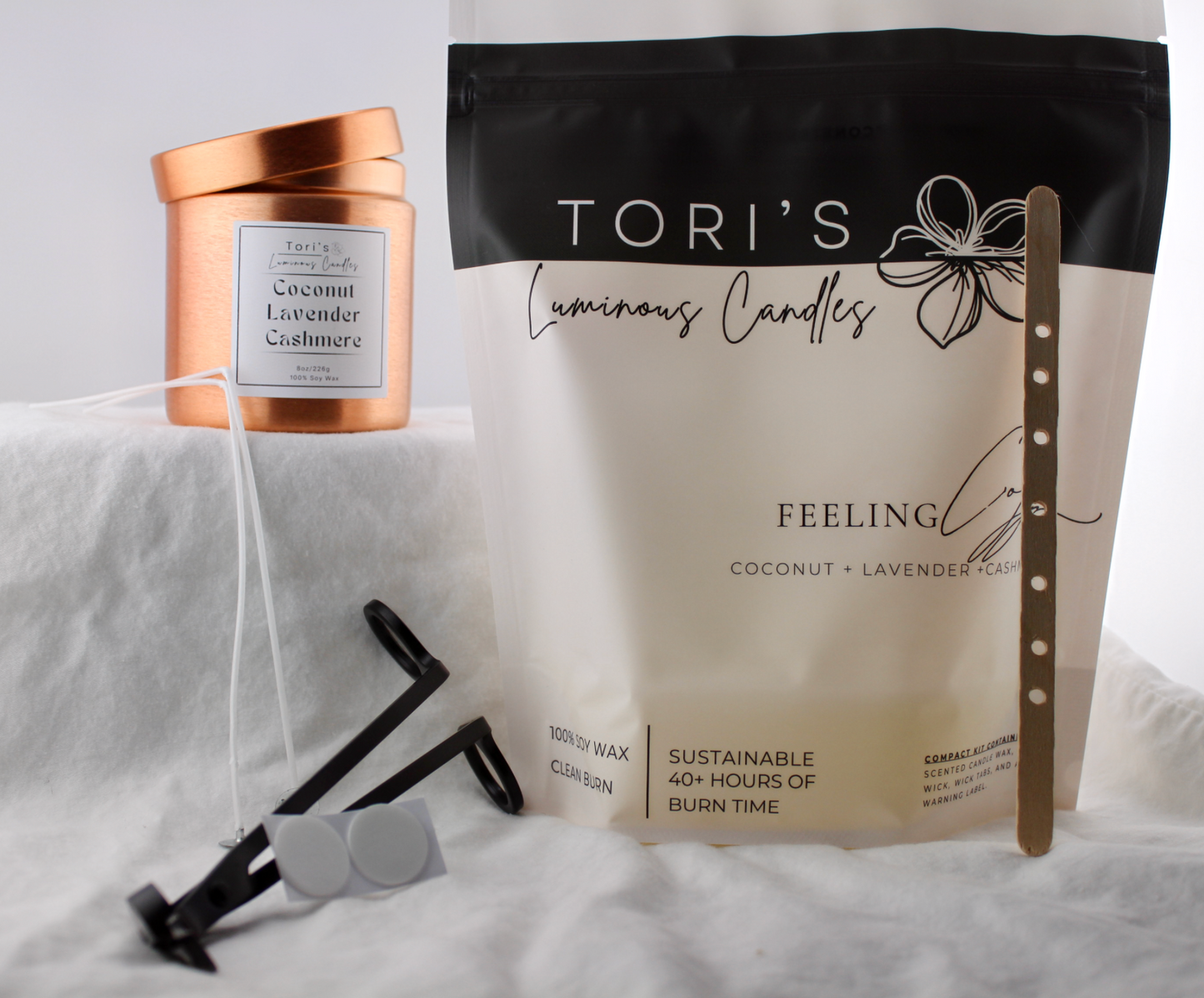 Coconut, lavender, and cashmere candle in an 8 oz copper vessel, styled with the Rewick & Chill refill kit and wick trimmer—offering a classy, cozy bundle for sustainable relaxation.