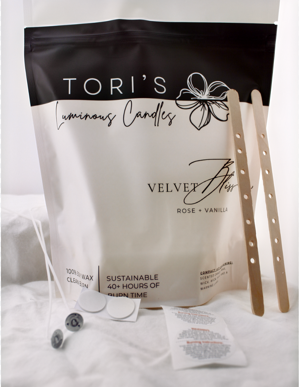 Rewick & Chill refill kit featuring rose and vanilla pre-scented soy wax, two cotton wicks, and two wick tabs—beautifully arranged for a stylish and sustainable candle-making experience at home