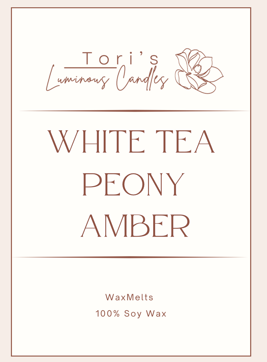 White tea, peony, and amber soy wax melts in modern packaging, offering a fresh floral and warm home fragrance.