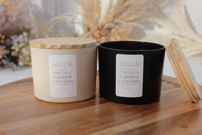 Coconut, lavender, and cashmere candle in now a 12oz in both matte cream and matte black candle vessel—offering a classy, cozy bundle for sustainable relaxation.