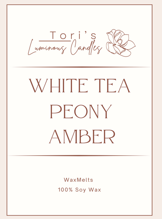 White tea, peony, and amber soy wax melts in modern packaging, offering a fresh floral and warm home fragrance.